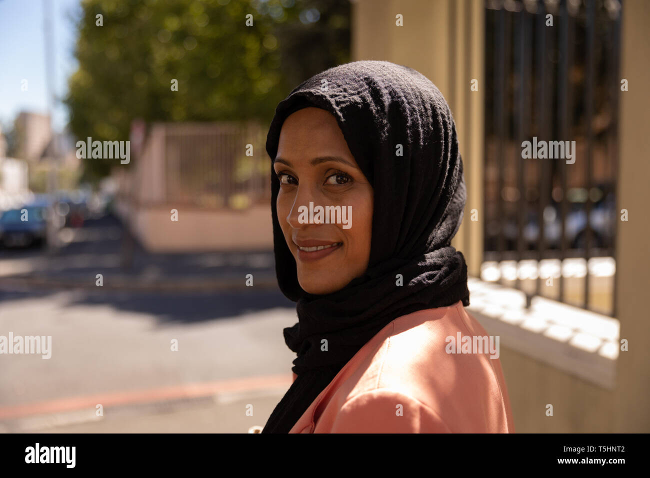 Woman standing on a street hi-res stock photography and images - Alamy