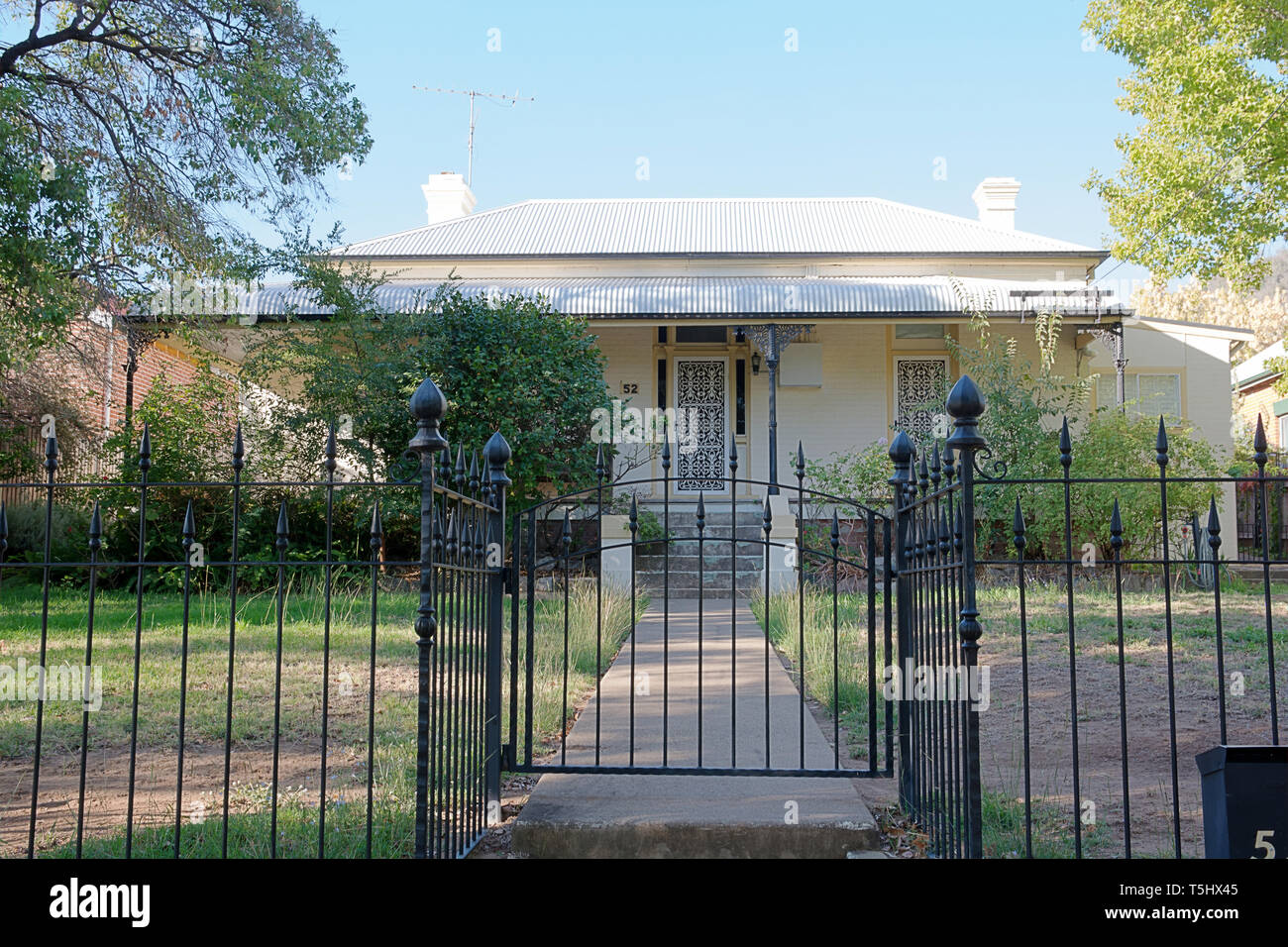 A c1910s suburban cottage built in the mid Victorian Style. Tamworth NSW Australia. Stock Photo