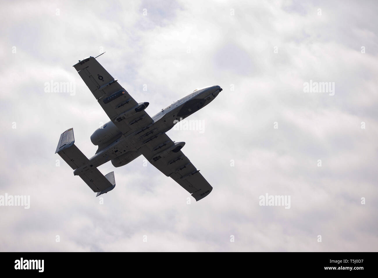 U.S. Air Force A-10C Thunderbolt II, from the 175th Wing of the Maryland Air National Guard, is flown by a 104th Fighter Squadron pilot during a 227th Air Support Operations Squadron JTAC Initial Qualification Training scenario, at the 177th Fighter Wing's Warren Grove Bombing Range, in Burlington County, N.J. April 18, 2019. The IQT prepares JTACS to take the next step towards becoming combat mission ready. (U.S. Air National Guard photo by Senior Master Sgt. Andrew J. Moseley) Stock Photo