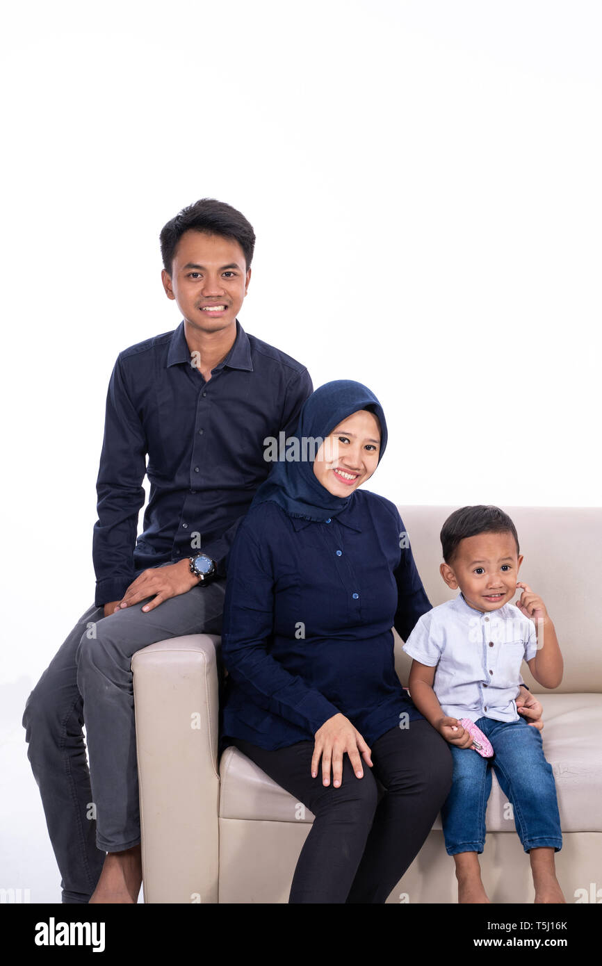 muslim father and mother with son isolated Stock Photo - Alamy