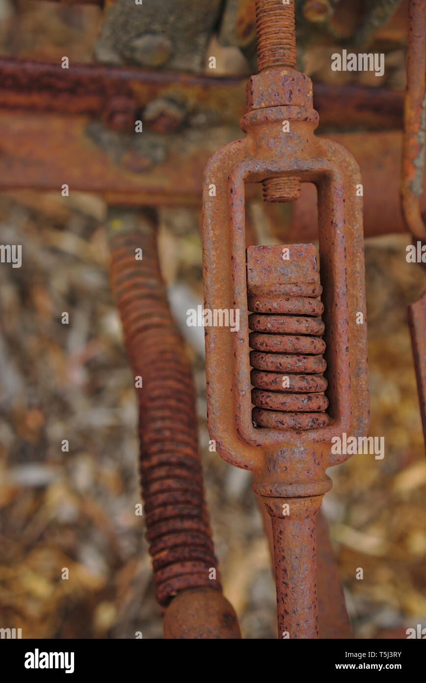 Close up view of rusty spring part of old machinery Stock Photo