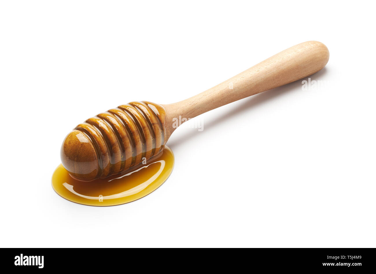 Honey dipper isolated on white background Stock Photo