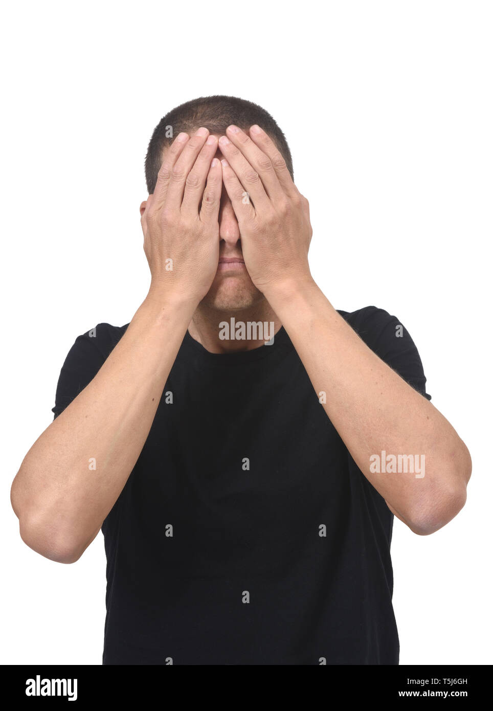 man cover his eyes with his hands Stock Photo Alamy