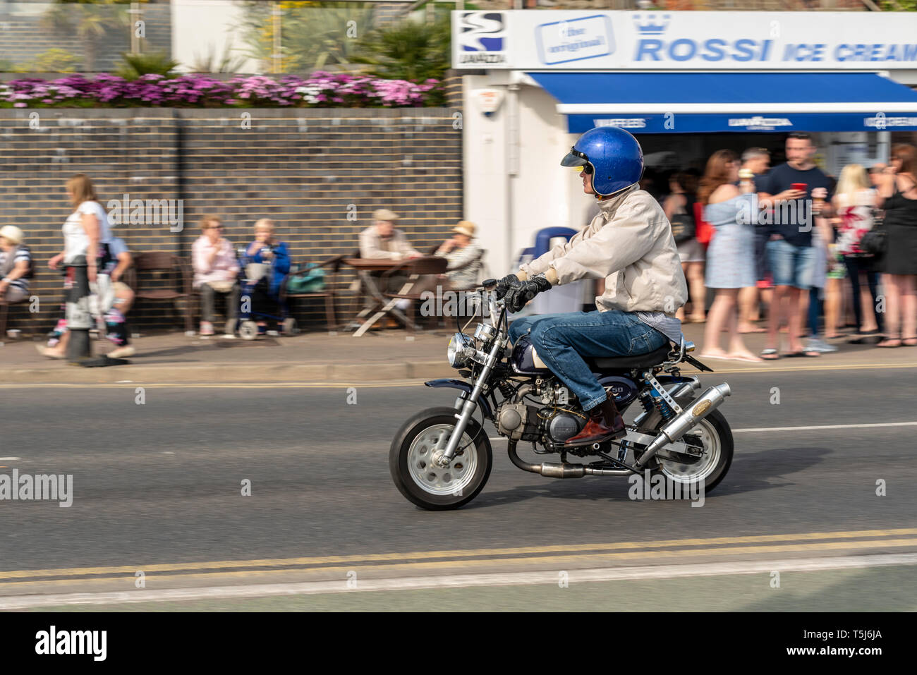 fat man on monkey bike