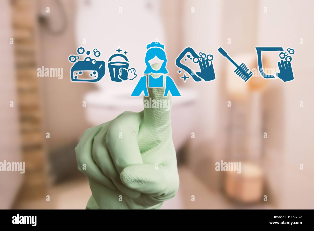 Person touching maid symbol on transparent display wearing sanitary gloves as housework and chores concept Stock Photo