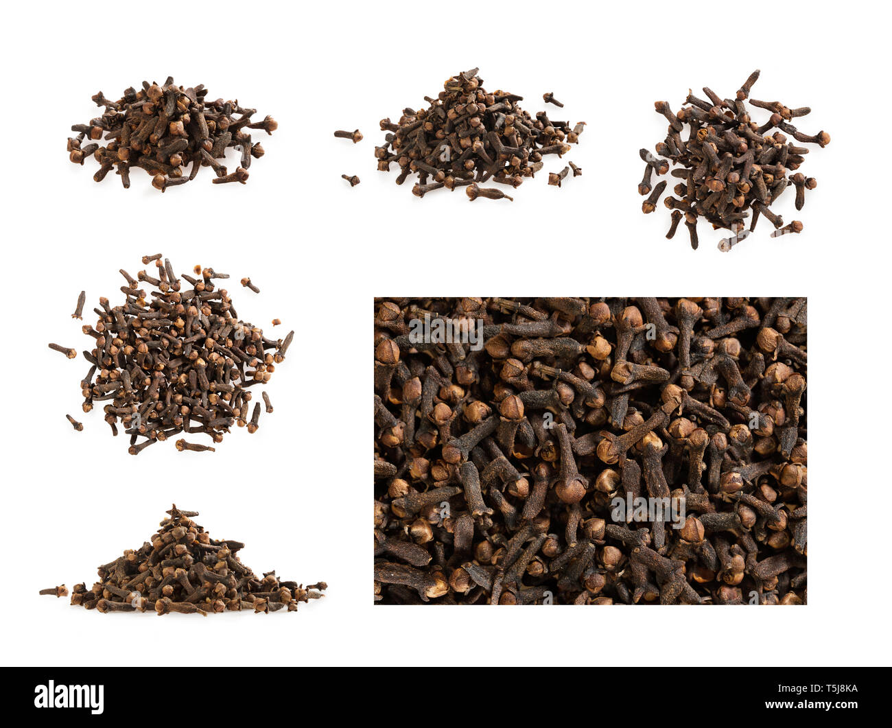 Big set of clove heap isolatedo on white. A pile of cloves Stock Photo