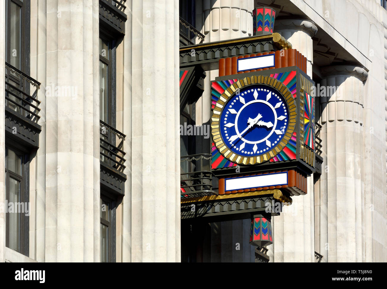 London, England, UK. Art Deco Clock on Peterborough Court, 135 Fleet