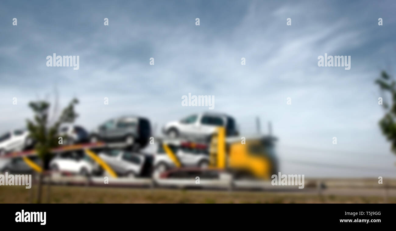 Strong blurred unrecognizable truck transport on road. Transport overpasses on the highway for the transport of orders and goods Stock Photo