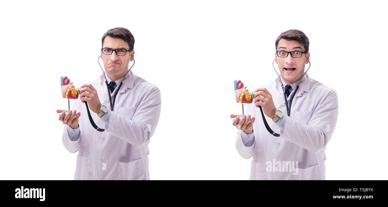 Young doctor with heart shape isolated on white Stock Photo - Alamy