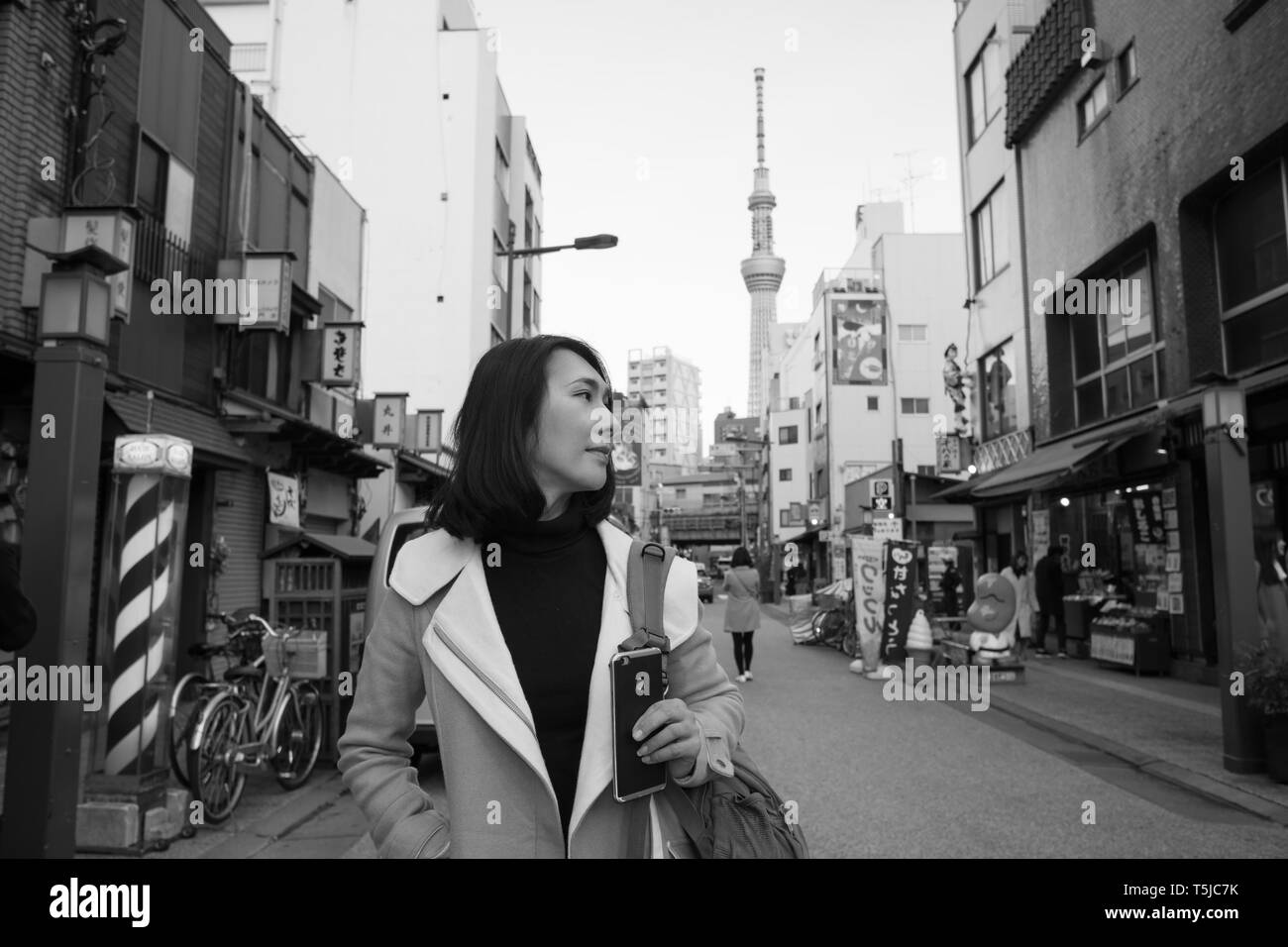 Irene Street Portrait with Tokyo Skytree Background. Stock Photo