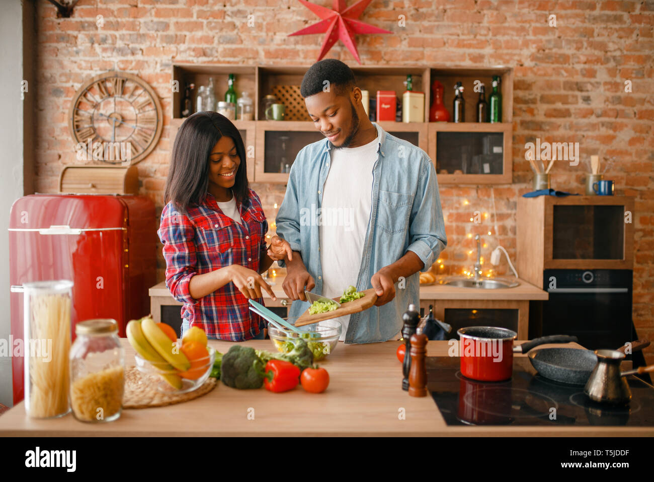 African family healthy meal preparing hi-res stock photography and