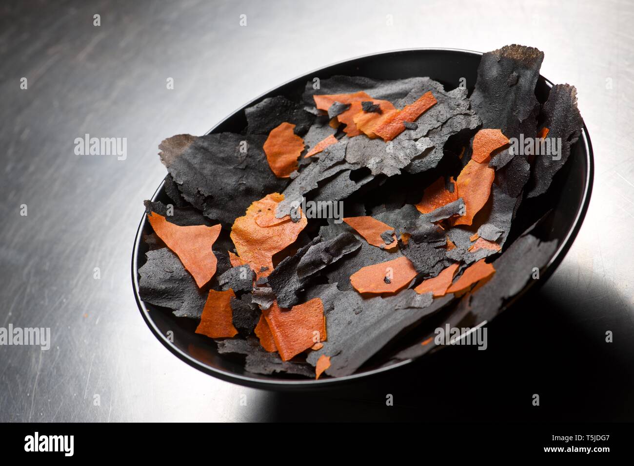 Colored chips in a bowl. Stock Photo