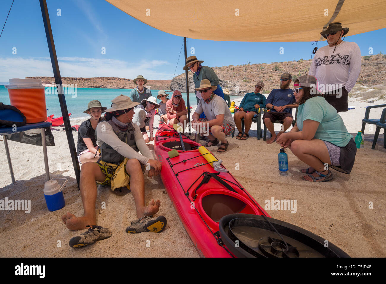 Guide giving sea kayak instruction to group on Espiritu Santo Island, Baja California Sur, Mexico. Stock Photo