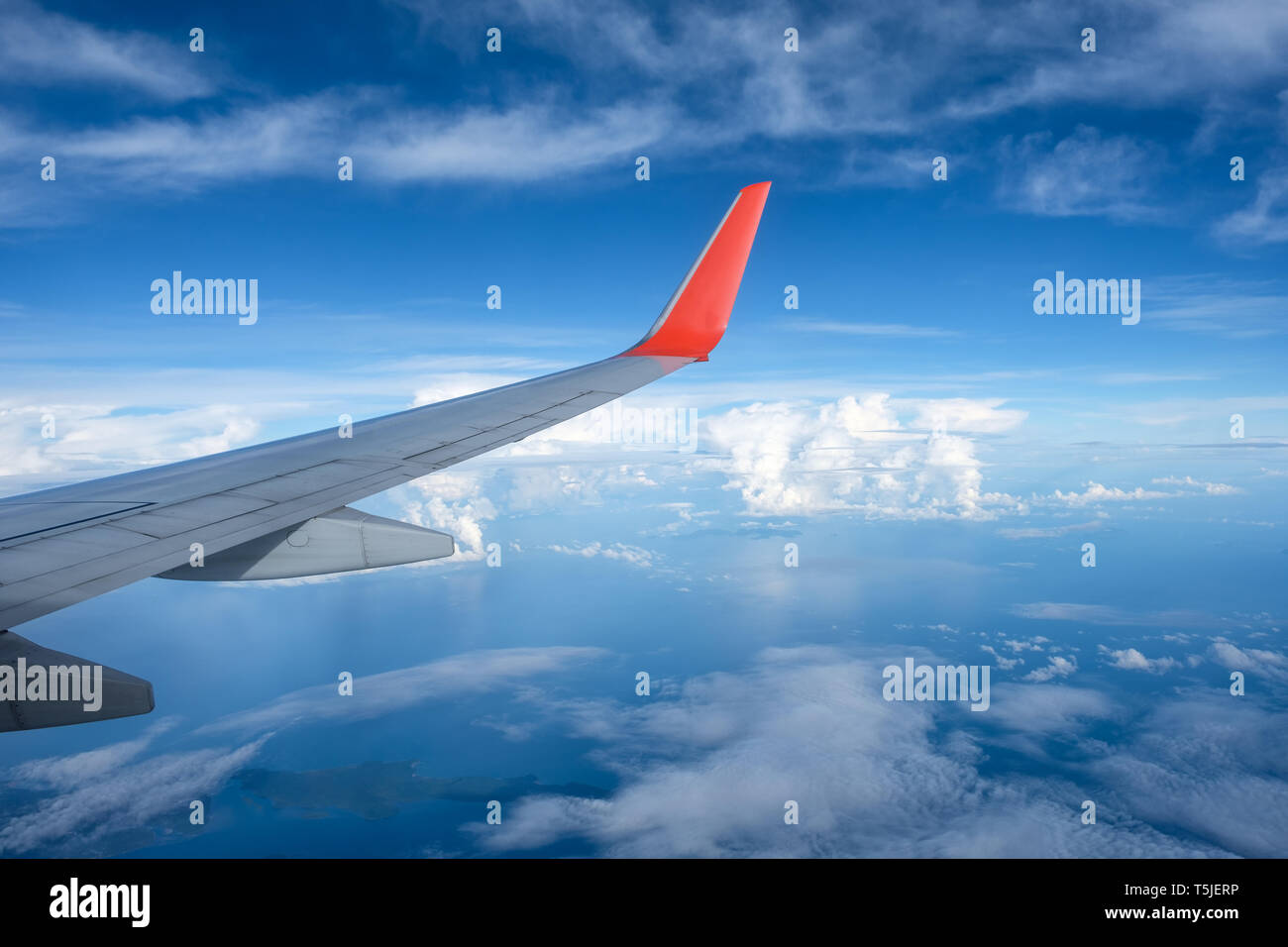 Airplane wing flying above earth hi-res stock photography and images ...
