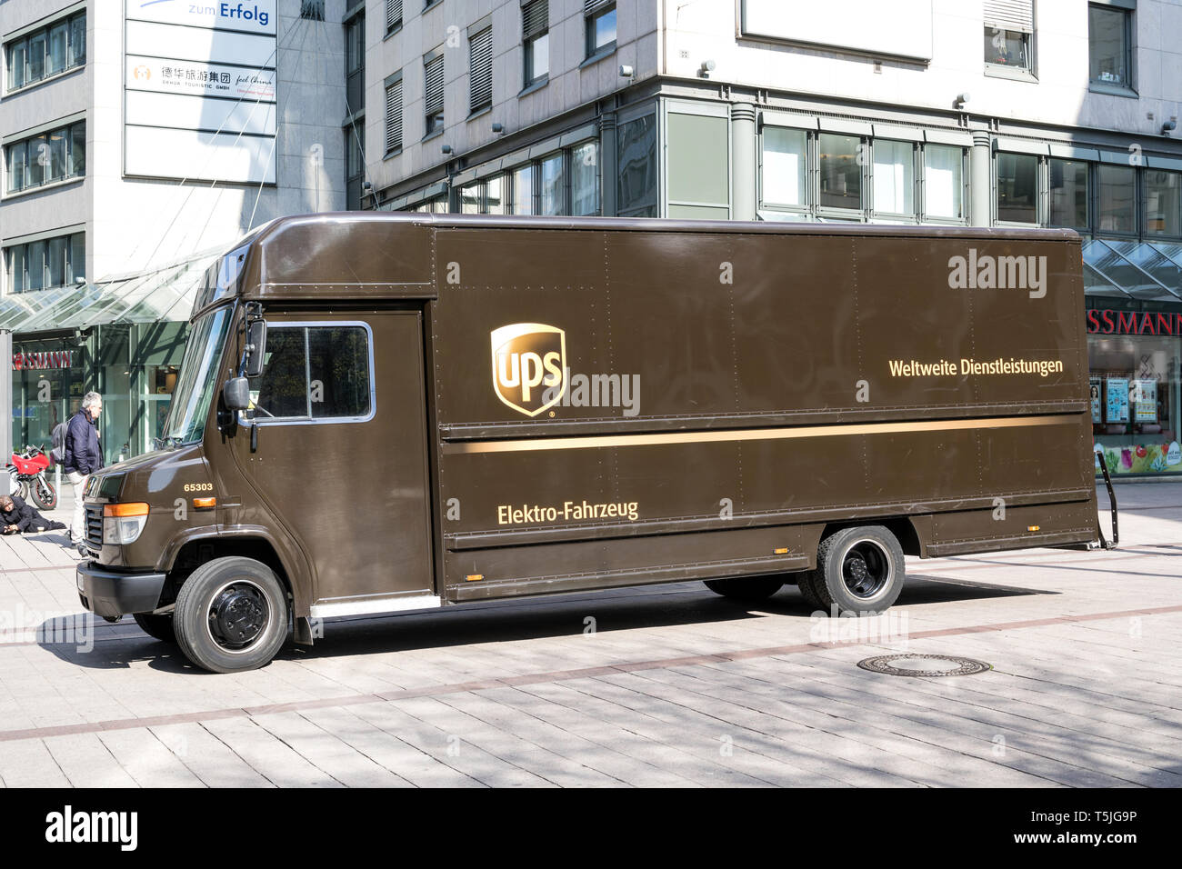 Electric powered UPS delivery van. UPS is the world's largest package delivery company and a provider of supply chain management solutions. Stock Photo