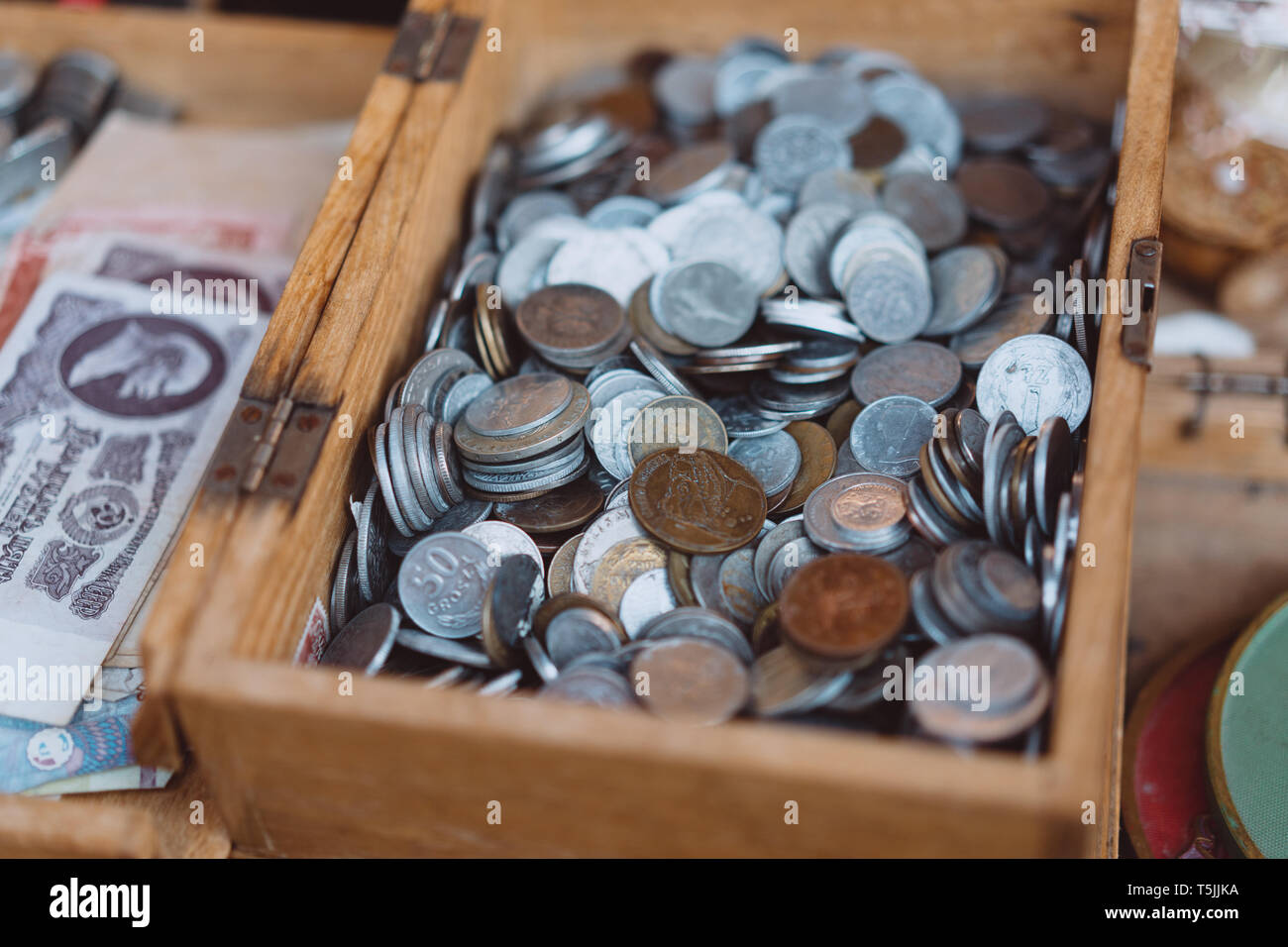 Old coins of different denominations are in a small wooden box Stock Photo Alamy