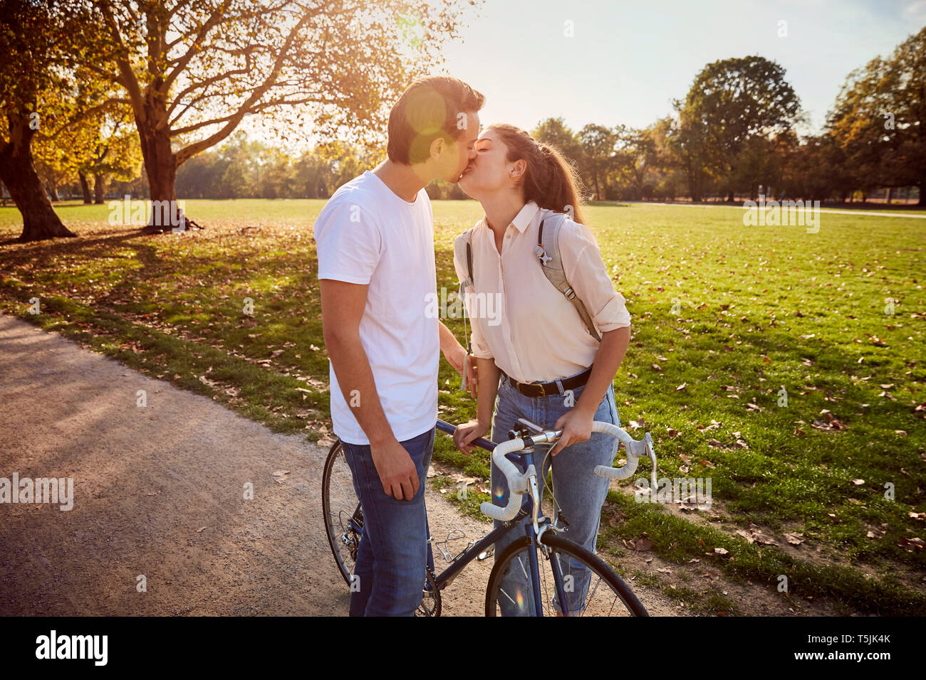 Young couple in love kissing hi-res stock photography and images - Alamy