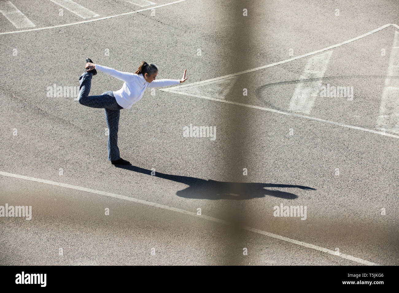 Senior woman doing pilates exercise Stock Photo