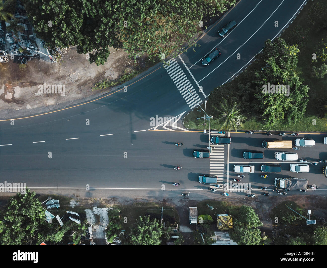 Indonesia, Bali, Sanur, Aerial view of cars and motorbikes on the road Stock Photo