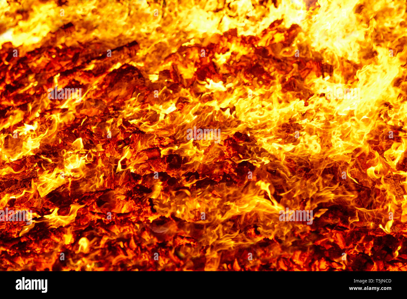 Fire. Volcano incandescent material. Hot charcoal bonfire. Carbon