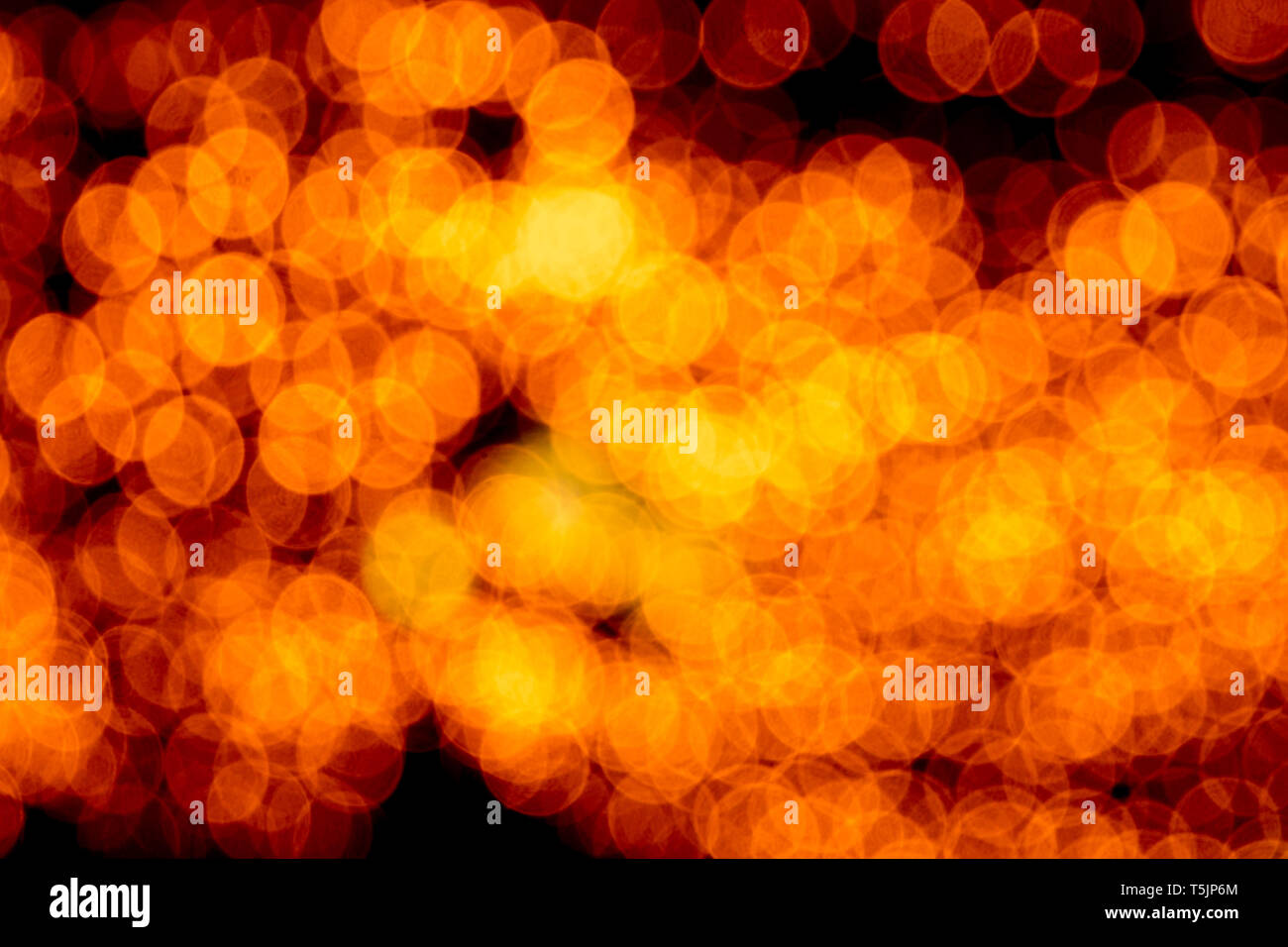 Unfocused Abstract Orange Bokeh On Black Background Defocused And Blurred Many Round Light Stock Photo Alamy