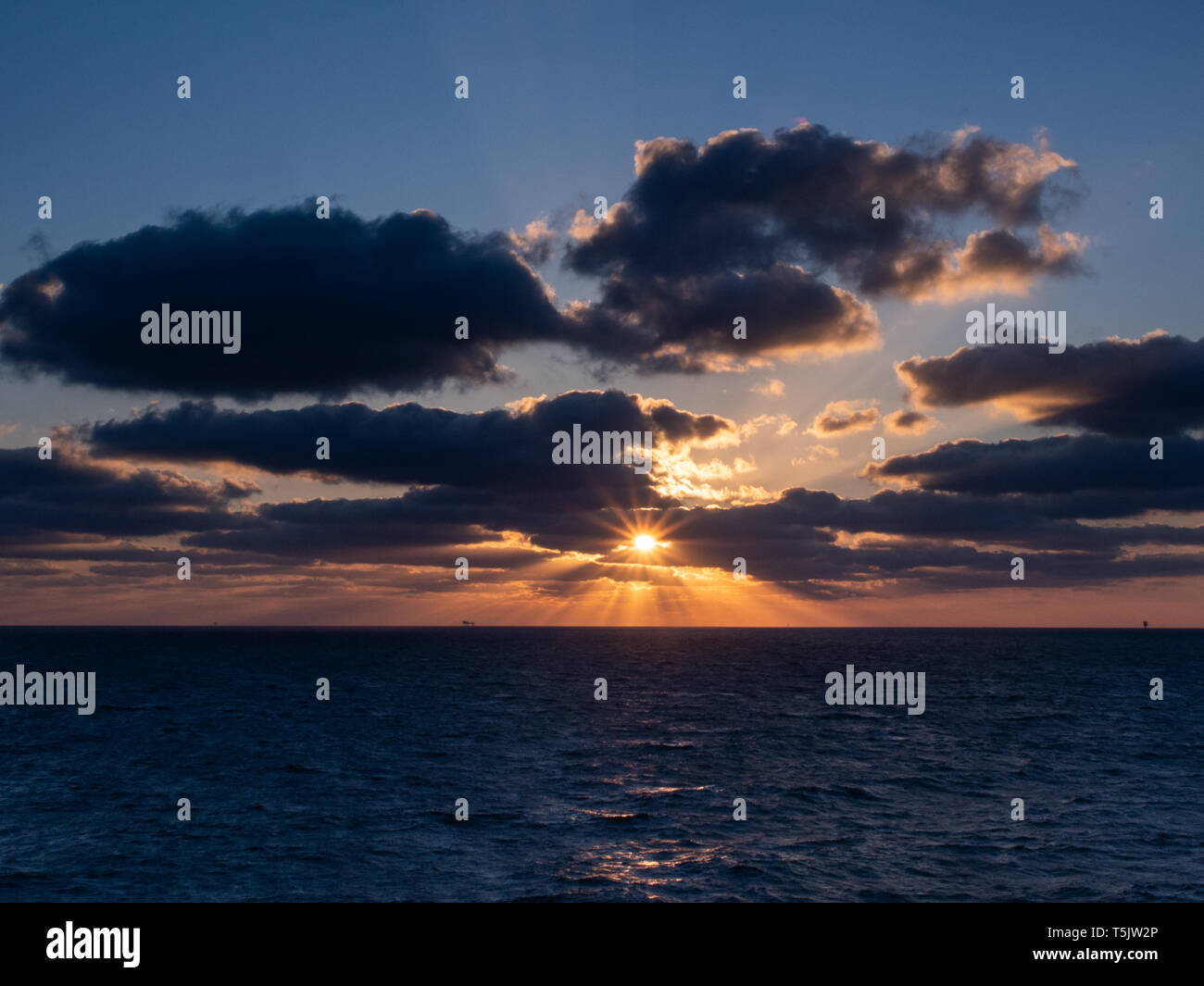 Sunrise over North Sea platform Stock Photo