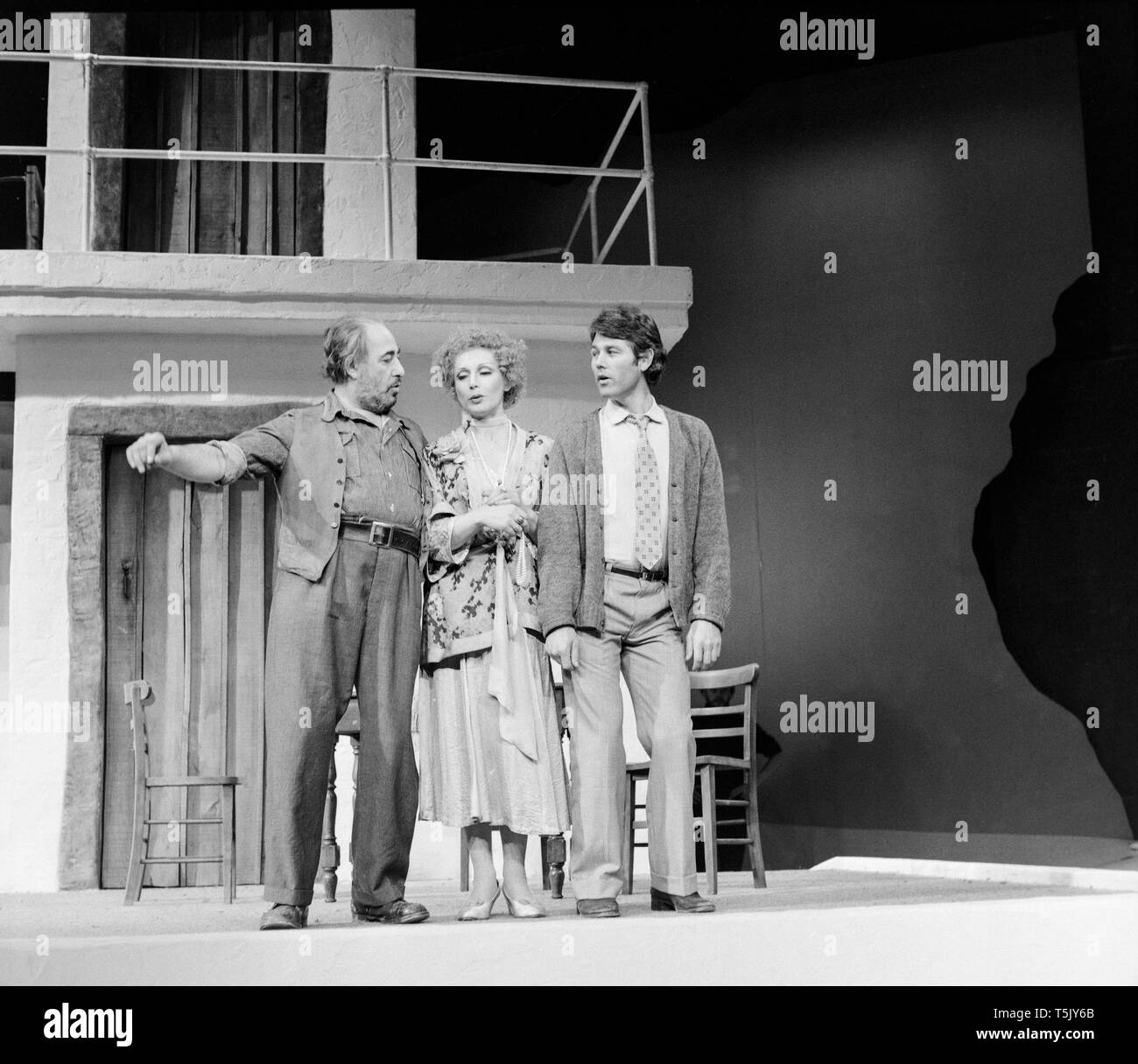 English actor Alfred Marks, Scottish actor Jim Smilie, and English actress Miriam Karlin, on stage at The Greenwich theatre in London, during rehearsals for the play Zorba, in November 1973. Marks played the role of Zorba, Karlin the role of Madame Hortense, and Smilie the role of Nikos. Stock Photo