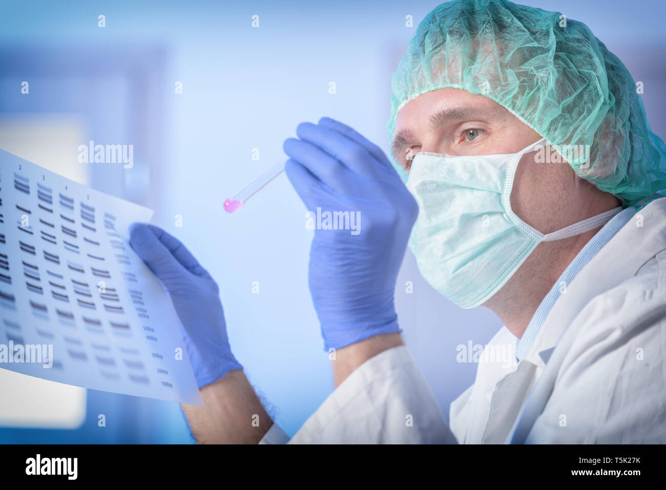 Scientist analizing DNA sequence in the modern laboratory Stock Photo ...