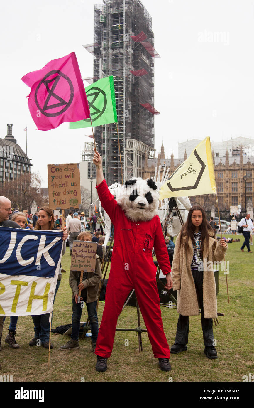 Extinction Rebellion protestors with banners and placards in London ...