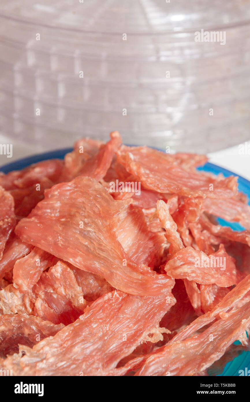 Dried meat 300 grams lies on plastic scales Stock Photo Alamy