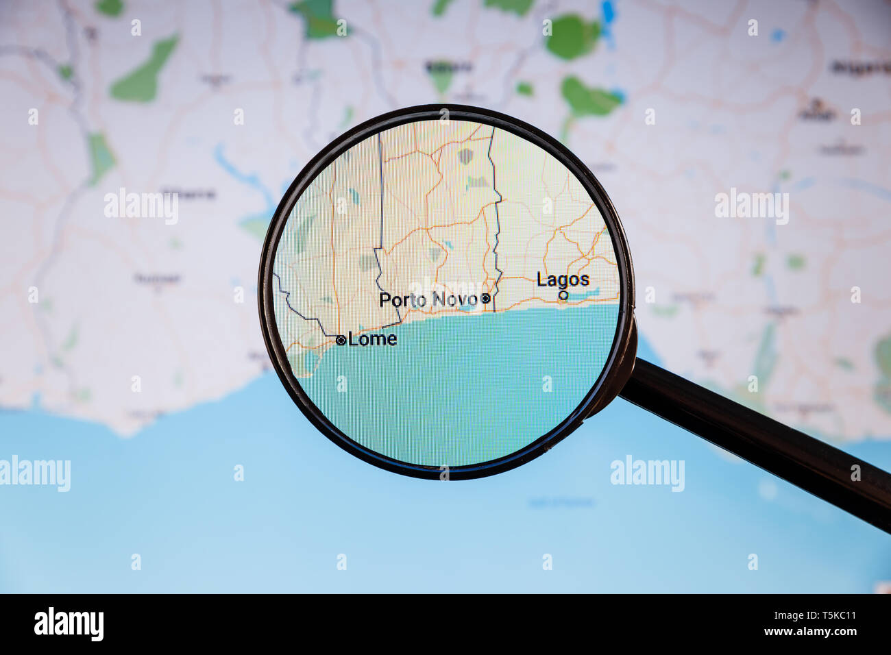 Porto Novo, Benin. Political map. City visualization illustrative concept on display screen through magnifying glass. Stock Photo
