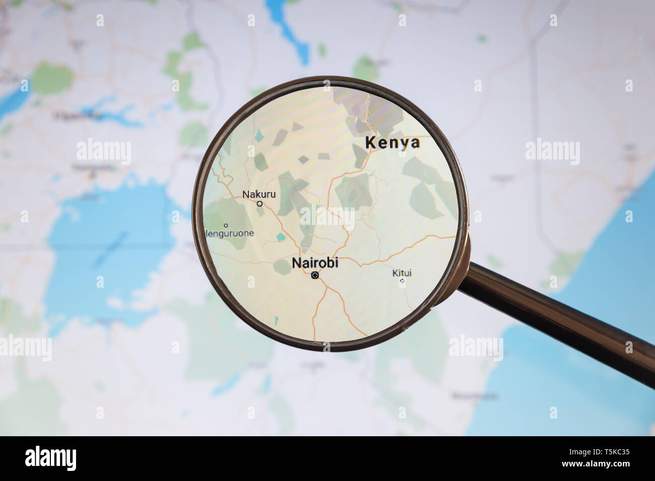 Nairobi, Kenya. Political map. City visualization illustrative concept on display screen through magnifying glass. Stock Photo