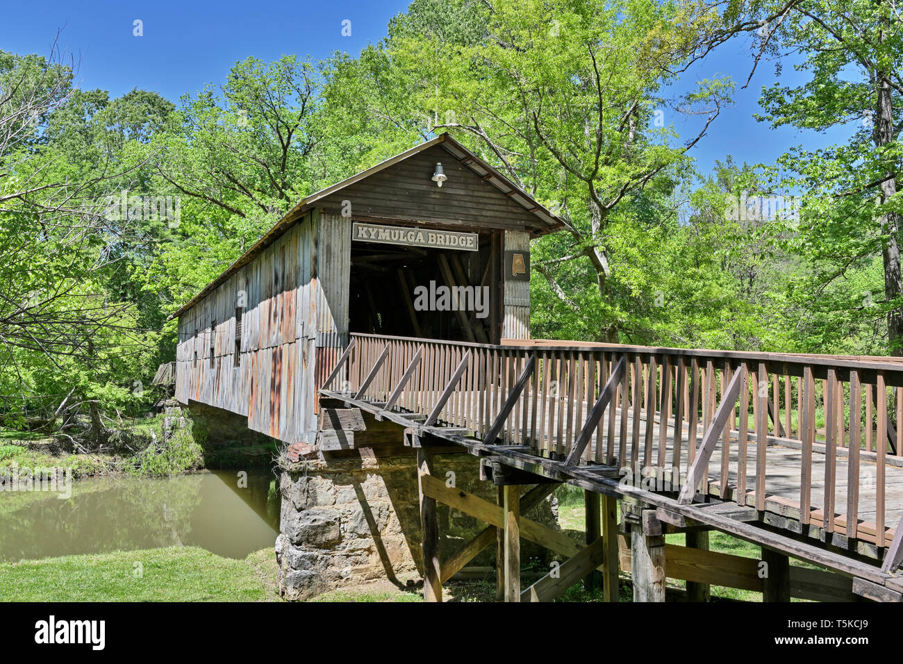 Kymulga covered bridge over Talladega creek in Childersburg, Alabama, USA, an outdoor museum and park. Stock Photo