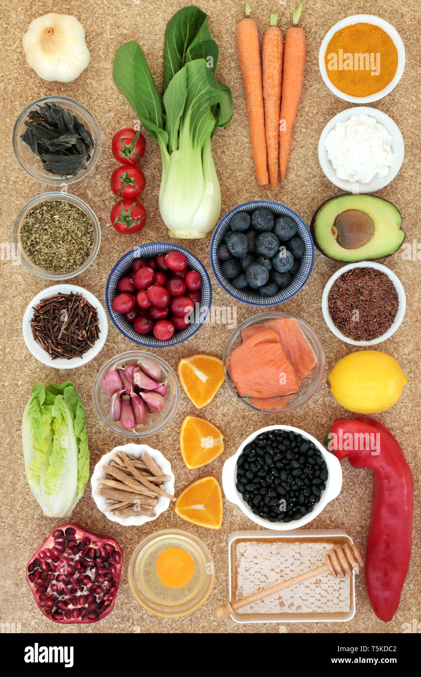 Super food to slow the ageing process concept with fish, fruit ...