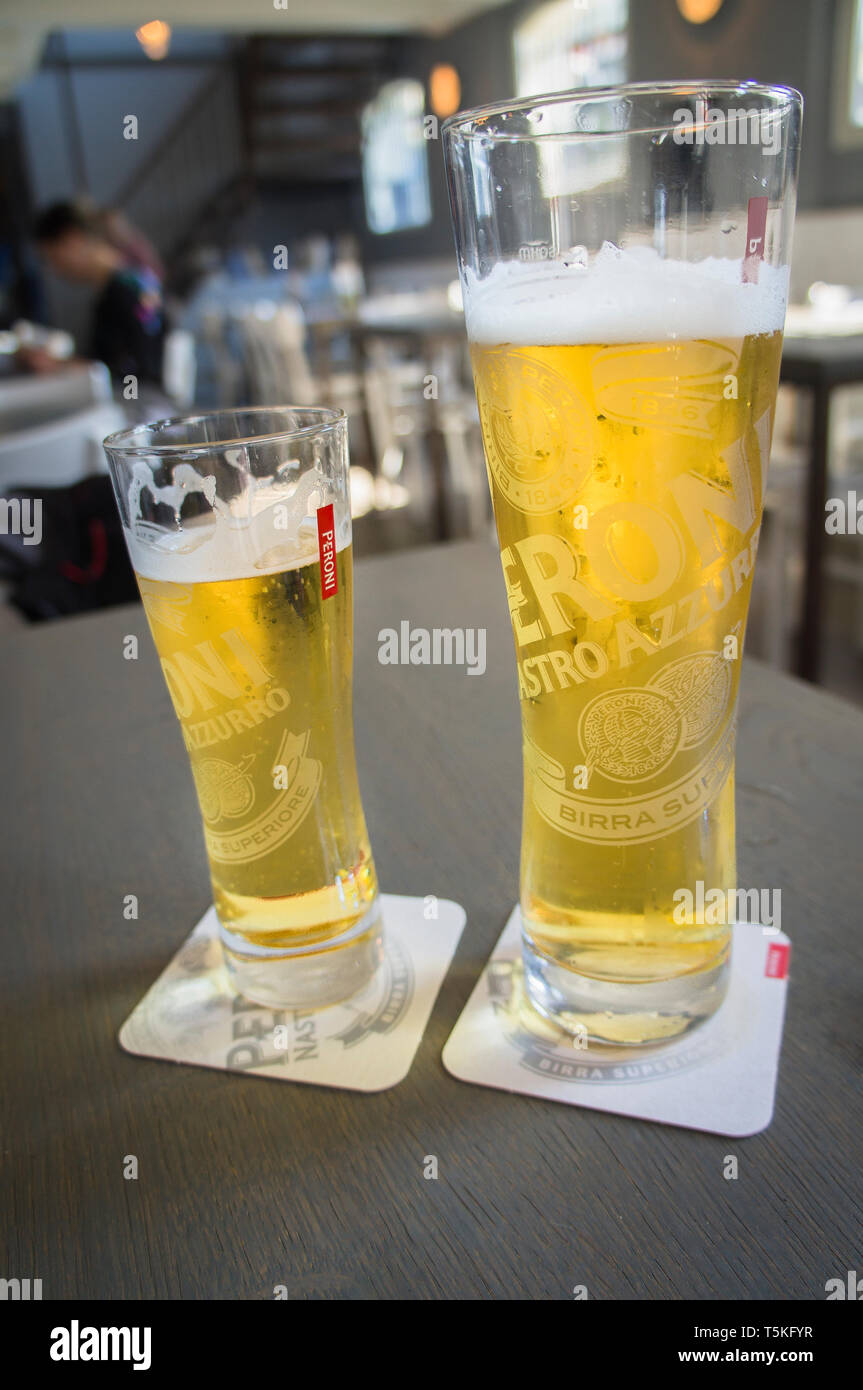 https://c8.alamy.com/comp/T5KFYR/nastro-azzurro-beer-glass-half-litre-peroni-brewery-beer-mat-amsterdam-netherlands-on-sunday-april-7-2019-ctk-photolibor-sojka-T5KFYR.jpg