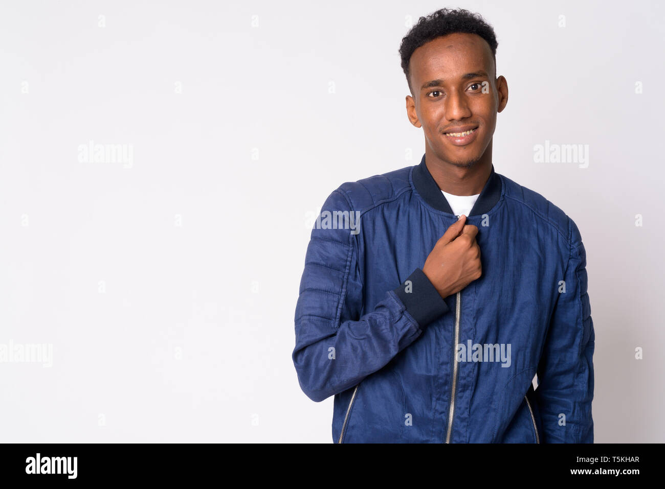 Portrait of young happy African man smiling Stock Photo - Alamy