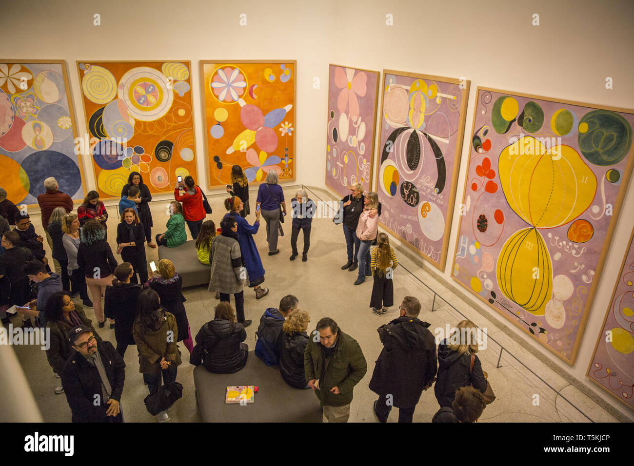 Museum goers at the Guggenheim Museum in New York City view the Hilma af Klint exhibition the
