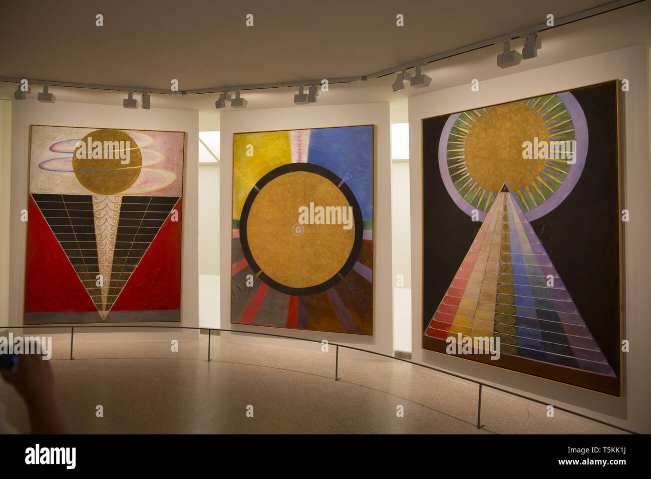 Museum goers at the Guggenheim Museum in New York City view the Hilma af Klint exhibition the