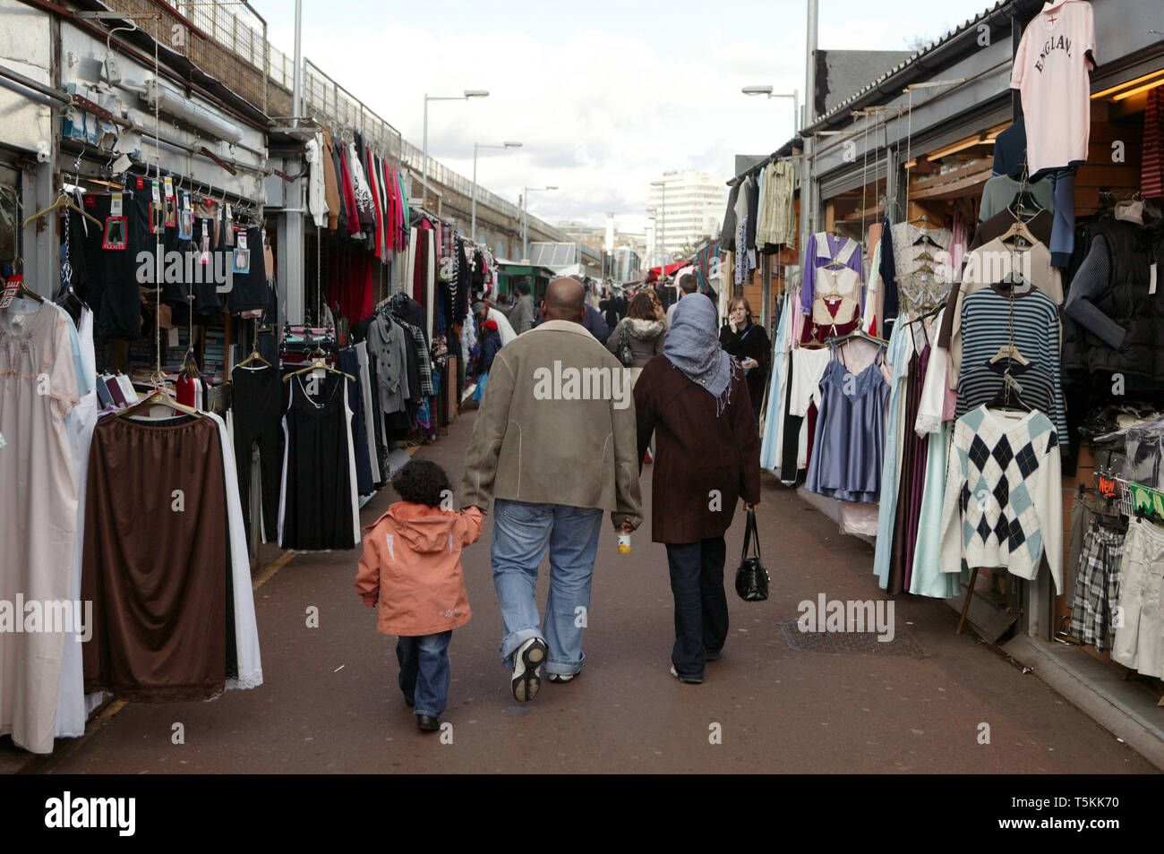 Browsing goods at Shepherd’s Bush Market. Hammersmith, London. 28