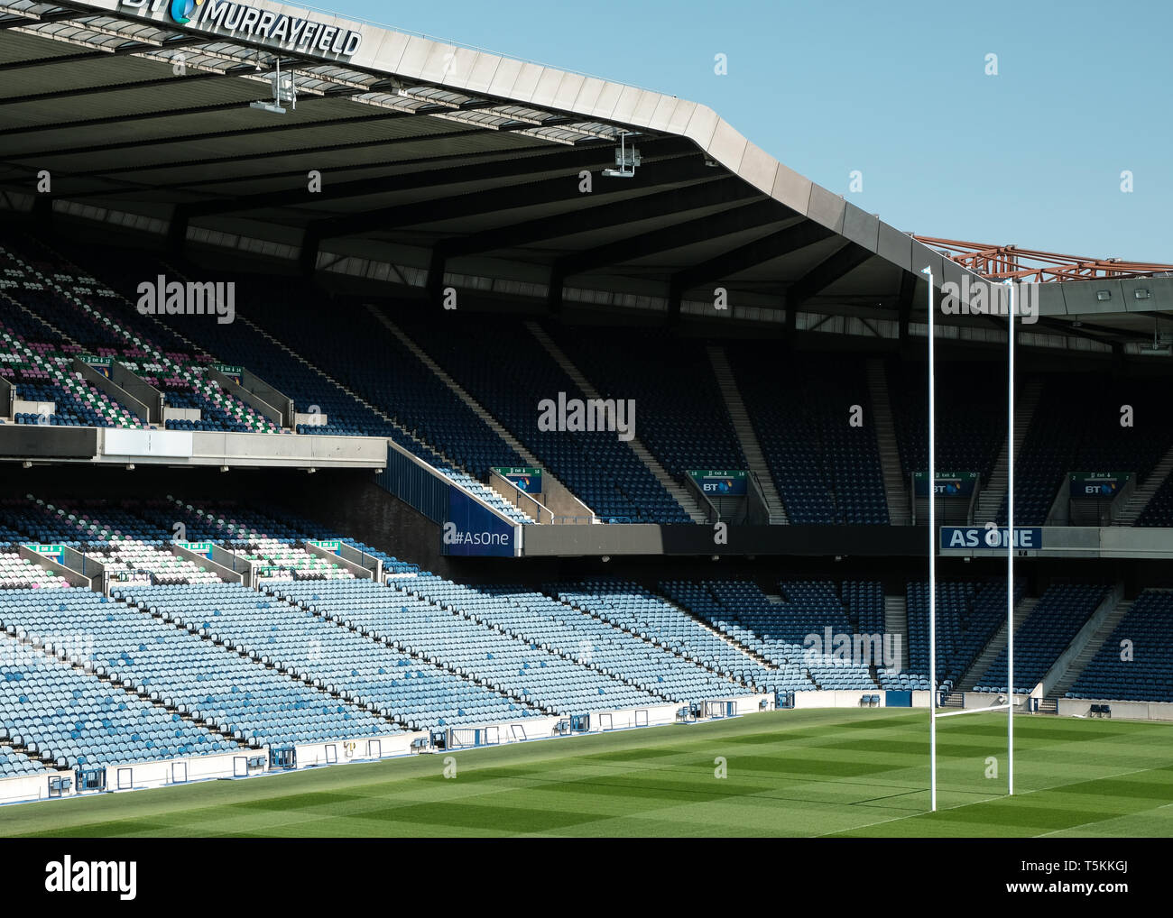 Murrayfield rugby stadium showing the north end stands and goalpost whilst empty on a sunny day, Edinburgh, East Lothian, Scotland Stock Photo