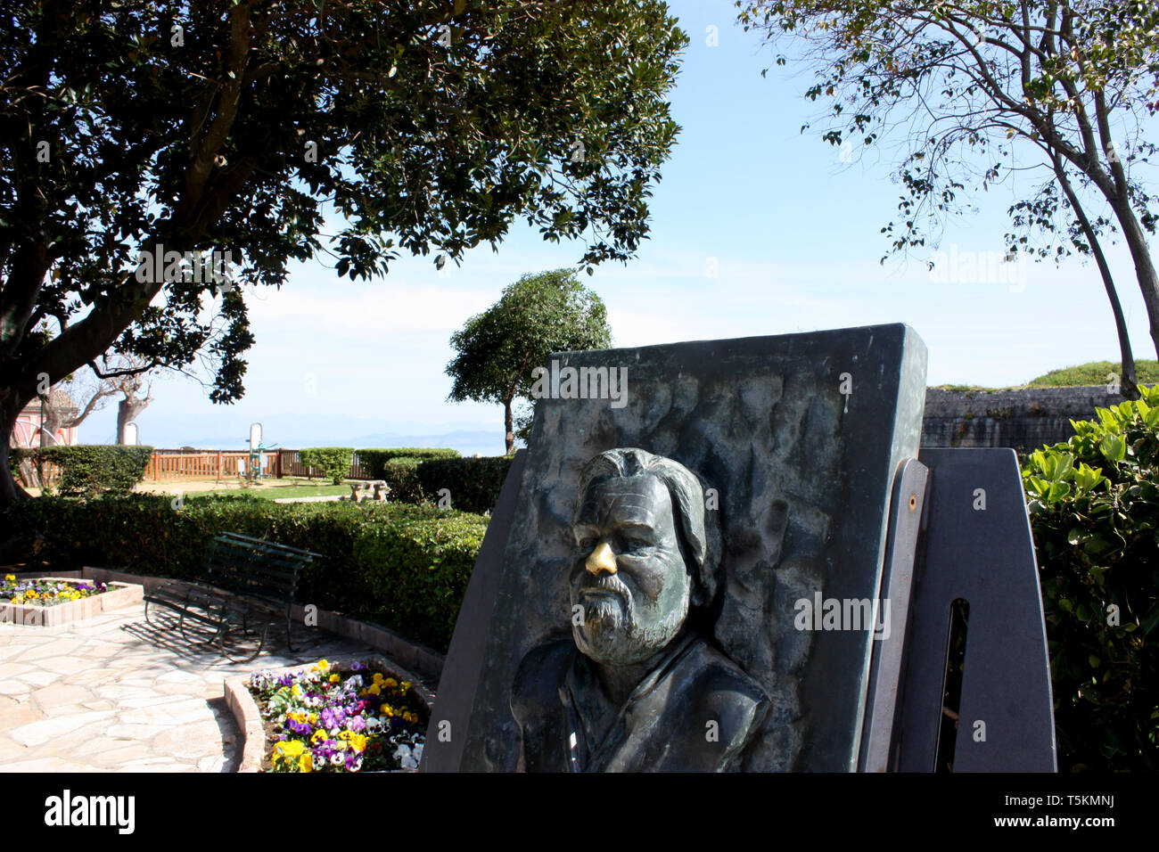 A statue of Gerald Durrell in the gardens by the sea in the old town of