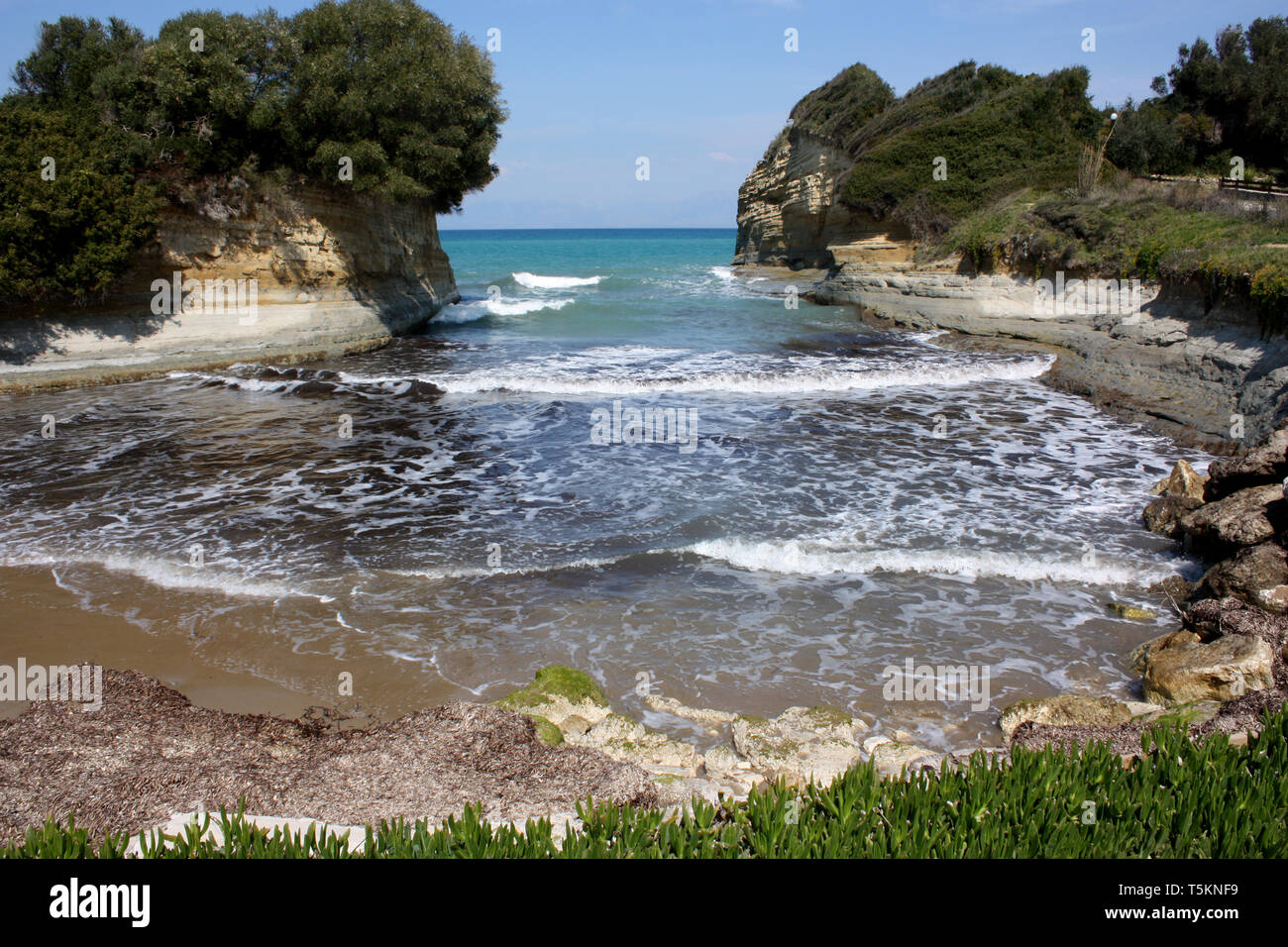 A small seaside bay at Sidari on the north coast of Corfu, one of the Ionian islands of Greece. Stock Photo