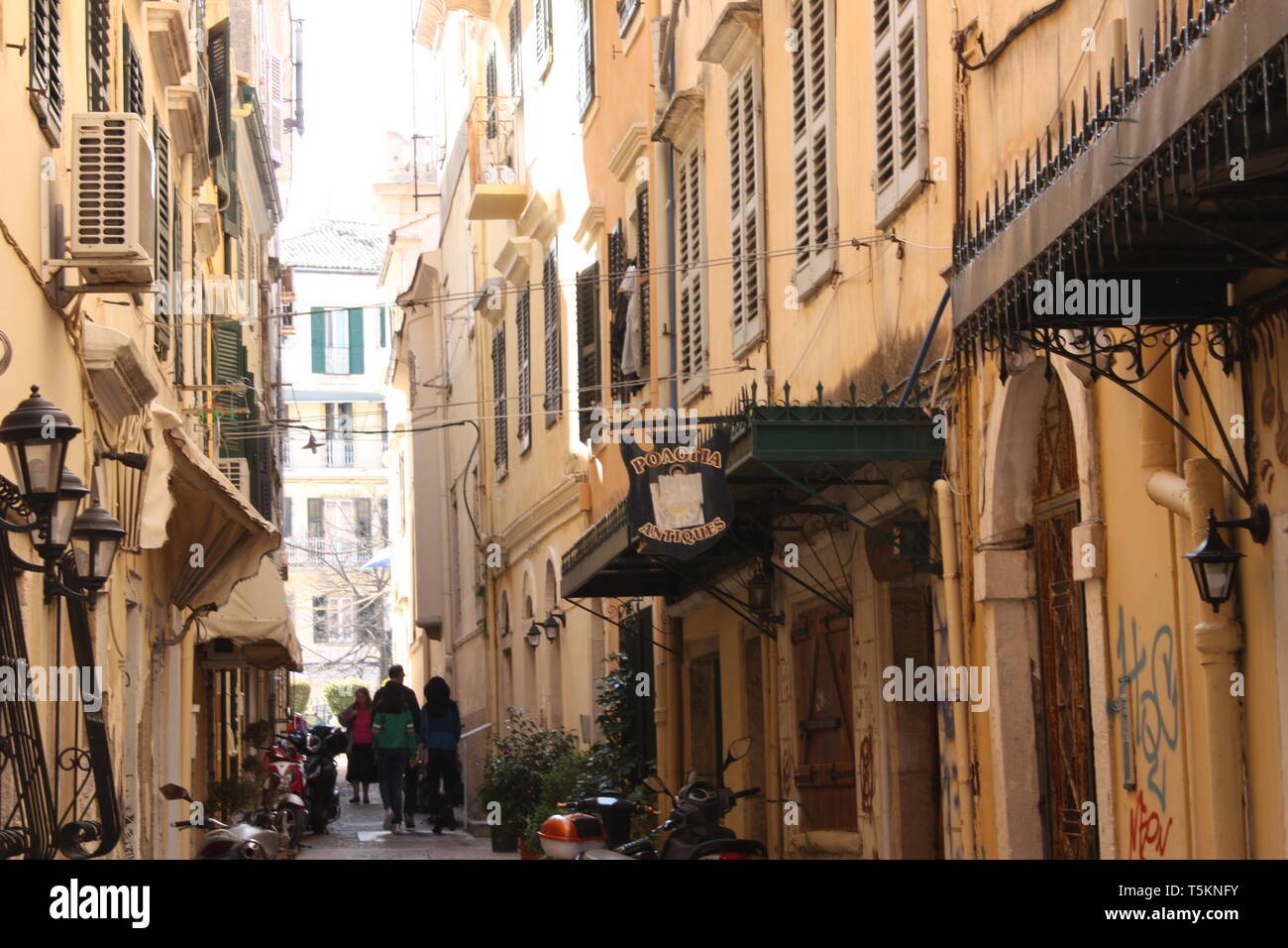 View along the street called Vlassopoulou in the old town of Corfu Stock Photo