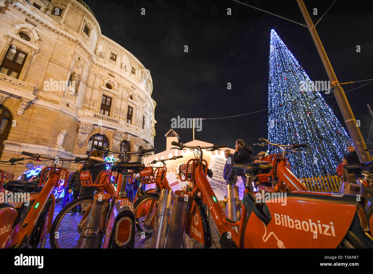 Bicycle rental next to the Arriaga Theater in Bilbao for Christmas Stock Photo