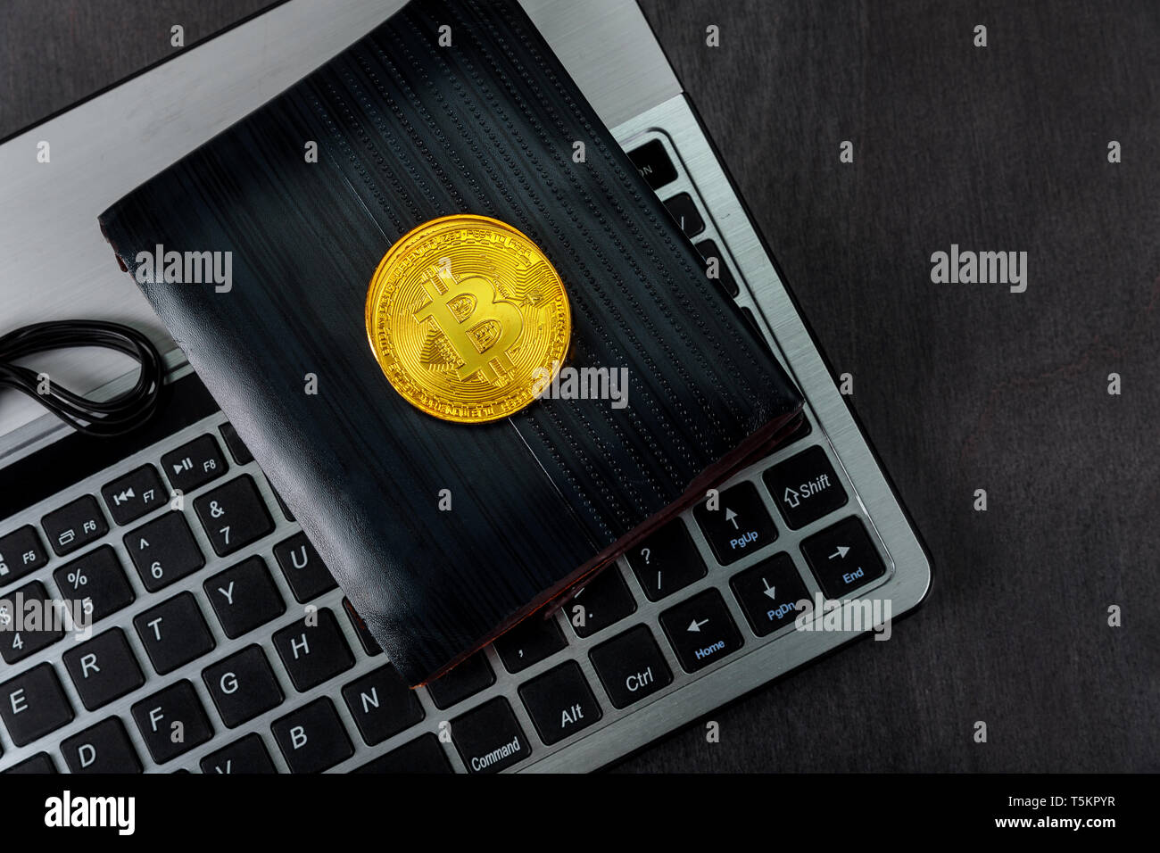 New Digitall Symbol Of A New Virtual Currency Wallet Over Keyboard - 