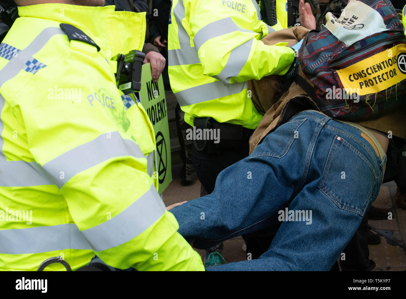 London, UK. 25th Apr 2019. Police arrest Extinction Rebellion protesters at Bank Junction in the City of London for obstructing the highway Credit: Ian Davidson/Alamy Live News Stock Photo