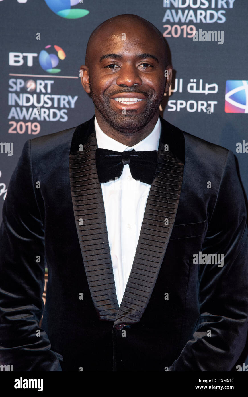 London, UK. 25th Apr, 2019. Fabrice Muamba appears on the red carpet