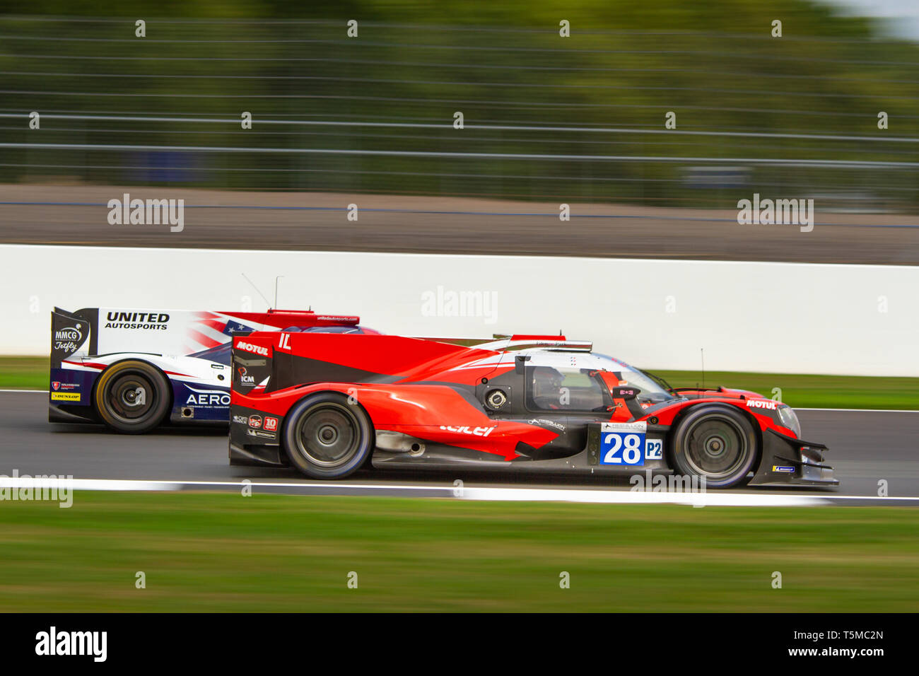 IDEC Sport LMP2 car passes a United Autosports LMP2 during the ELMS 4 Hours of Silverstone, 2018 Stock Photo