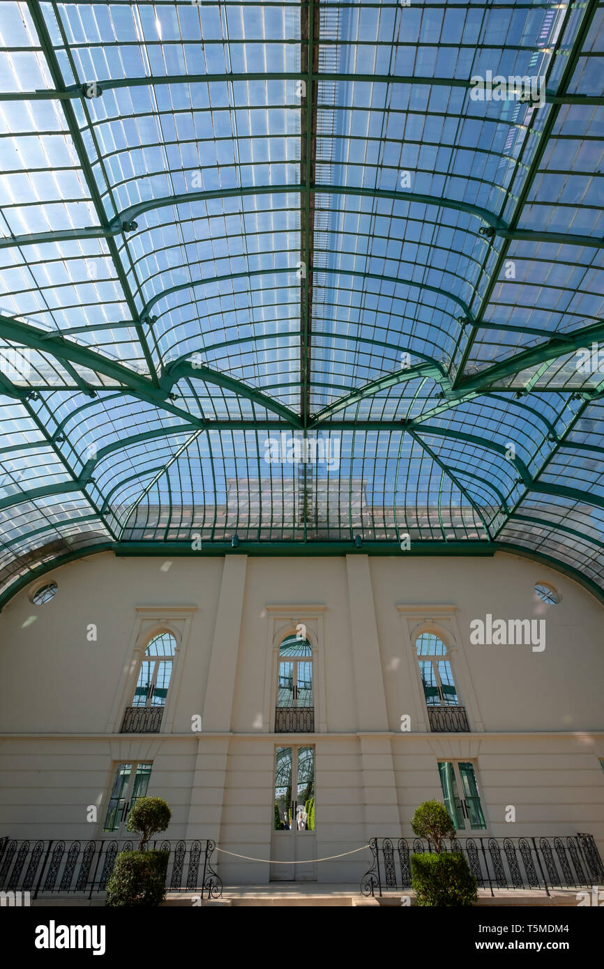 The interior of the Orangery at the Royal Greenhouses at Laeken. The complex of greenhouses is open to the public for three weeks a year in spring. Stock Photo