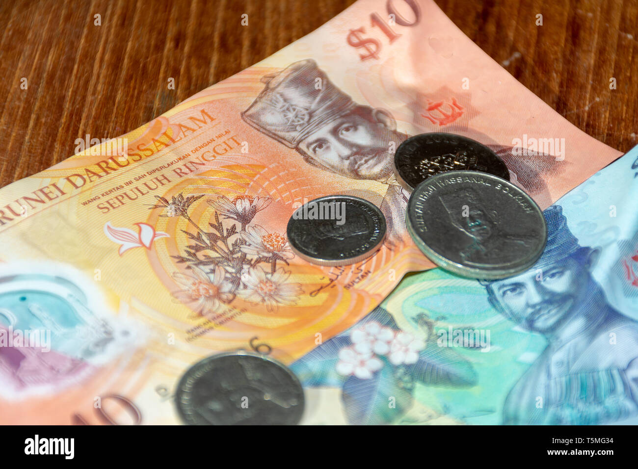 The dollar Currency of the Brunei Darussalem notes spread out on the